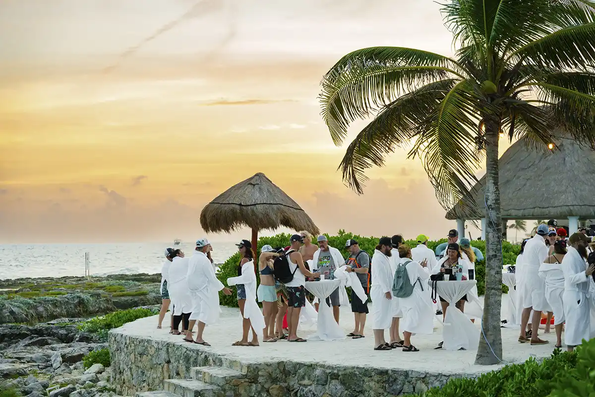 Guests interacting with eachother during a loyalty club party.