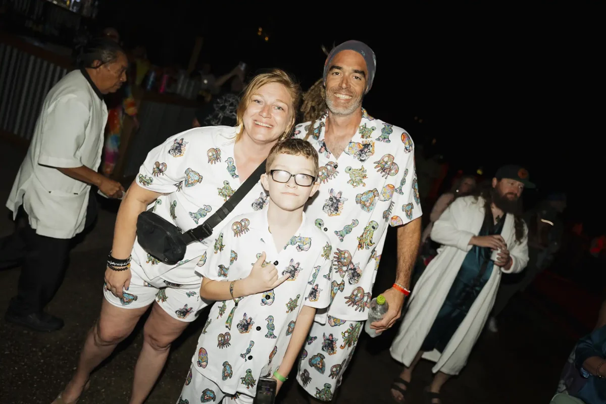 Group photo of a family in matching theme night costumes.
