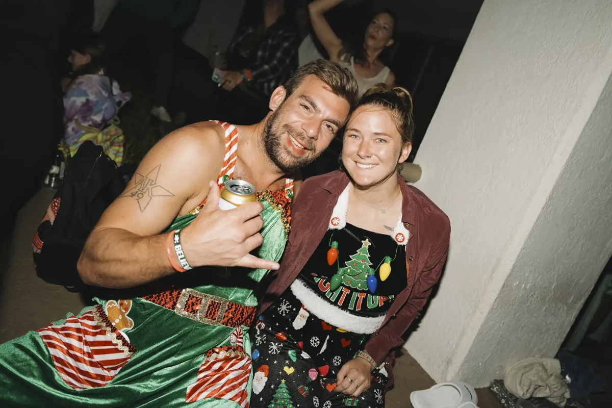 Couple posing in theme night costumes.