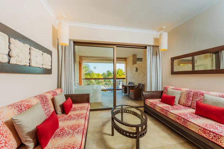 Living room area with open patio balcony.