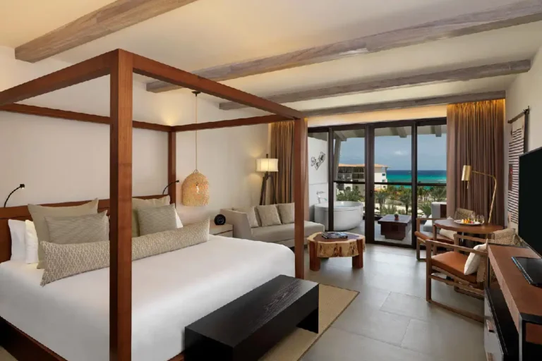 Main bedroom suite with ocean view balcony.