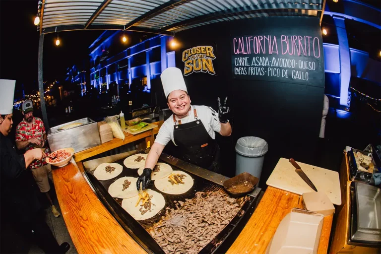 Concert Courtyard food stall, resort staff cooking tacos.